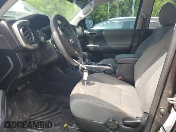 2017 Toyota Tacoma SR5 с VIN 3TMCZ5AN3HM081109, выставлен на аукционе Copart как лот 61154625 с пробегом 59 552 миль миль и Списание • Salvage title. История ставок и продаж доступна на DreamBid. Изображение 7.