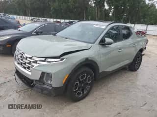 2023 Hyundai Santa Cruz SEL Premium с VIN 5NTJDDAF6PH051083, выставлен на аукционе Copart как лот 69608535 с пробегом 137 822 миль миль и На запчасти • Non repairable. История ставок и продаж доступна на DreamBid. Изображение 1.