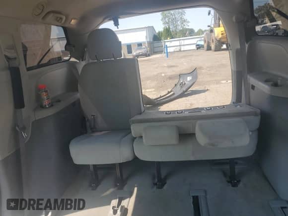 2012 Toyota Sienna with VIN 5TDZK3DC4CS237227, listed as a Copart auction lot 68947005 with 219,993 mi miles and Salvage title. Bid and sale history available at DreamBid. Image 10.