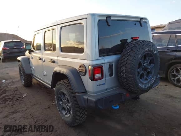 2023 Jeep Wrangler with VIN 1C4JJXN65PW612855, listed as a IAAI auction lot 41285856 with 11,868 mi miles and . Bid and sale history available at DreamBid. Image 3.