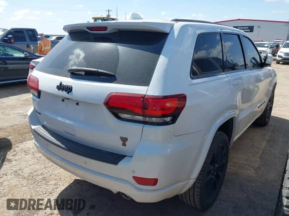 2021 Jeep Grand Cherokee Laredo X with VIN 1C4RJFAGXMC809948, listed as a IAAI auction lot 42806650 with 71,623 mi miles and . Bid and sale history available at DreamBid. Image 4.