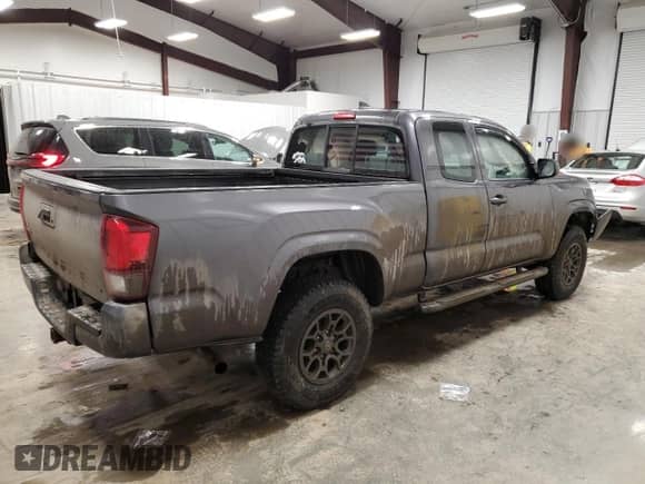 2018 Toyota Tacoma SR with VIN 5TFSX5EN4JX062063, listed as a Copart auction lot 47062045 with 96,087 mi miles and Salvage title. Bid and sale history available at DreamBid. Image 3.