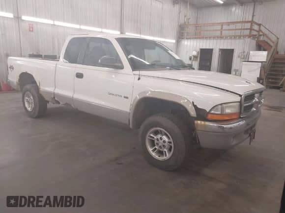 1999 Dodge Dakota SLT with VIN 1B7GG22XXXS254782, listed as a IAAI auction lot 41847644 with 164,607 mi miles and . Bid and sale history available at DreamBid. Image 1.