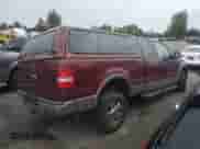 2006 Ford F-150 XLT with VIN 1FTPX14596NA49697, listed as a Copart auction lot 84584095 with 165,083 mi miles and Salvage title. Bid and sale history available at DreamBid. Image 3.