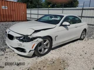 2015 BMW 4 Series 428i с VIN WBA3V5C56FP751474, выставлен на аукционе Copart как лот 71233245 с пробегом 98 936 миль миль и Списание • Salvage title. История ставок и продаж доступна на DreamBid. Изображение 1.