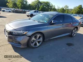 2020 Honda Accord Touring с VIN 1HGCV2F99LA005617, выставлен на аукционе Copart как лот 70045715 с пробегом 69 378 миль миль и Списание • Salvage title. История ставок и продаж доступна на DreamBid. Изображение 1.