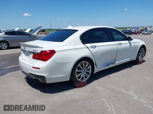 2013 BMW 7 Series 750Li xDrive with VIN WBAYF8C59DD141510, listed as a IAAI auction lot 42497077 with 137,254 mi miles and . Bid and sale history available at DreamBid. Image 4.