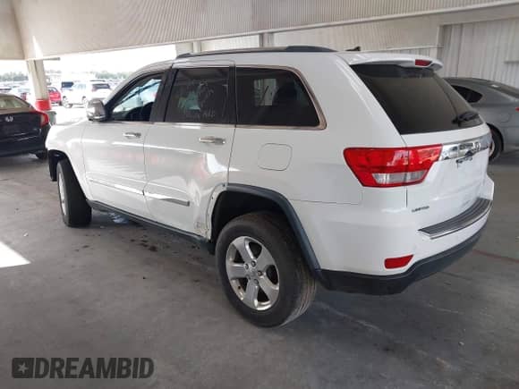 2013 Jeep Grand Cherokee Limited z VIN 1C4RJEBG6DC595730, wystawiony jako IAAI lot #43418036 z przebiegiem 163 431 mil mil oraz . Historia ofert i sprzedaży dostępna na DreamBid. Obrazek 3.