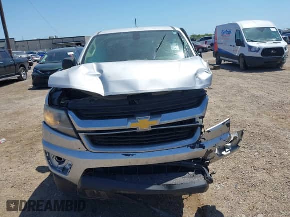 2018 Chevrolet Colorado 4WD Work Truck z VIN 1GCHTBEN5J1265177, wystawiony jako IAAI lot #42017849 z przebiegiem Nie podano mil oraz . Historia ofert i sprzedaży dostępna na DreamBid. Obrazek 13.