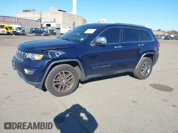 2018 Jeep Grand Cherokee Limited with VIN 1C4RJFBG8JC259417, listed as a IAAI auction lot 43499963 with 126,401 mi miles and . Bid and sale history available at DreamBid. Image 2.