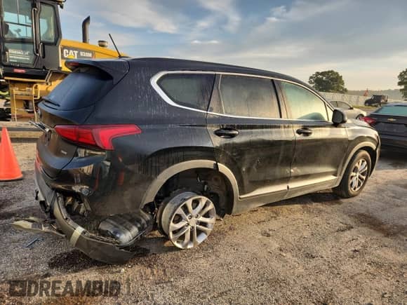 2019 Hyundai Santa Fe SE с VIN 5NMS2CAD1KH001442, выставлен на аукционе Copart как лот 84396335 с пробегом 86 239 миль миль и Списание • Salvage title. История ставок и продаж доступна на DreamBid. Изображение 3.