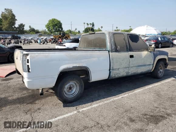 1997 GMC Sierra 1500 z VIN 2GTEC19R8V1527235, wystawiony jako Copart lot #66169475 z przebiegiem Nie podano mil oraz Szkoda całkowita • Salvage title. Historia ofert i sprzedaży dostępna na DreamBid. Obrazek 3.