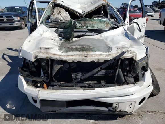 2013 Ford F-150 XL with VIN 1FTFW1CF1DFD22857, listed as a Copart auction lot 74128503 with Not provided miles and Salvage title. Bid and sale history available at DreamBid. Image 12.