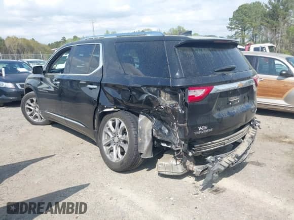2020 Chevrolet Traverse Premier with VIN 1GNERKKW0LJ123828, listed as a IAAI auction lot 41947690 with 91,905 mi miles and . Bid and sale history available at DreamBid. Image 3.