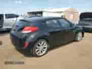 2013 Hyundai Veloster w/Black Int z VIN KMHTC6AD1DU125253, wystawiony jako Copart lot #67401815 z przebiegiem 105 150 mil mil oraz Szkoda całkowita • Salvage title. Historia ofert i sprzedaży dostępna na DreamBid. Obrazek 3.