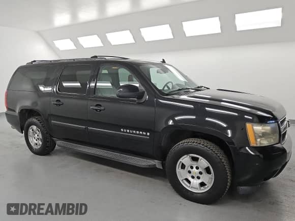 2007 Chevrolet Suburban LTZ z VIN 3GNFC16Y17G299614, wystawiony jako Copart lot #85654095 z przebiegiem 157 767 mil mil oraz Czysty tytuł • Clean title. Historia ofert i sprzedaży dostępna na DreamBid. Obrazek 4.