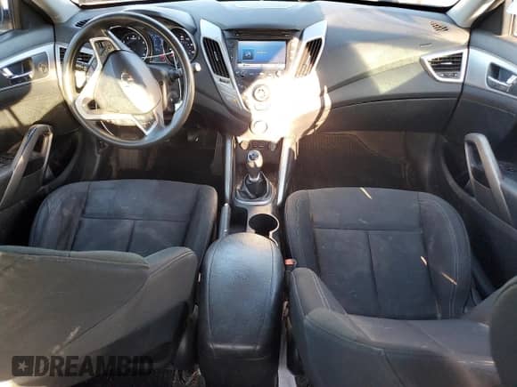 2013 Hyundai Veloster w/Black Int z VIN KMHTC6AD6DU180586, wystawiony jako Copart lot #81717425 z przebiegiem 91 070 mil mil oraz Szkoda całkowita • Salvage title. Historia ofert i sprzedaży dostępna na DreamBid. Obrazek 8.