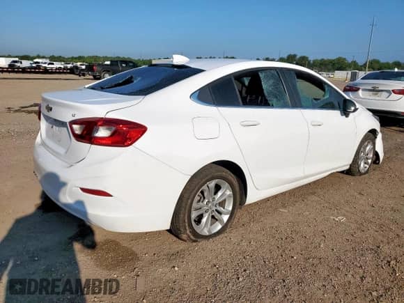 2019 Chevrolet Cruze LT с VIN 1G1BE5SM4K7146556, выставлен на аукционе Copart как лот 67545945 с пробегом 150 287 миль миль и Списание • Salvage title. История ставок и продаж доступна на DreamBid. Изображение 3.