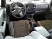 2008 Nissan Frontier SE with VIN 1N6AD07U28C407438, listed as a Copart auction lot 68758825 with 276,404 mi miles and Salvage title. Bid and sale history available at DreamBid. Image 8.