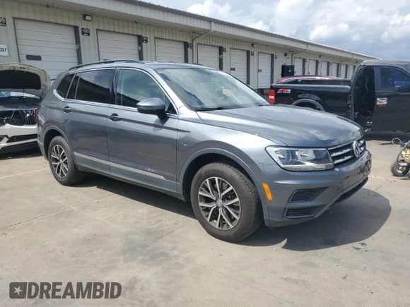 2020 Volkswagen Tiguan SE с VIN 3VV2B7AX1LM110727, выставлен на аукционе Copart как лот 64766175 с пробегом 74 419 миль миль и Списание • Salvage title. История ставок и продаж доступна на DreamBid. Изображение 4.