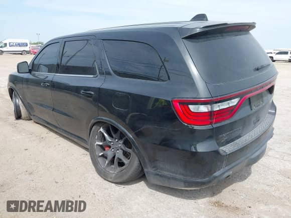 2021 Dodge Durango SRT Hellcat with VIN 1C4SDJH90MC689175, listed as a IAAI auction lot 42244275 with 17,240 mi miles and . Bid and sale history available at DreamBid. Image 3.