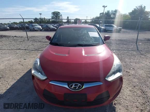 2013 Hyundai Veloster w/Gray Int z VIN KMHTC6AD7DU157057, wystawiony jako IAAI lot #43192334 z przebiegiem 120 938 mil mil oraz . Historia ofert i sprzedaży dostępna na DreamBid. Obrazek 12.