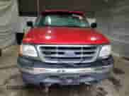 2000 Ford F-150 XL с VIN 1FTPF18L2YNA25370, выставлен на аукционе Copart как лот 69598605 с пробегом Не указан миль и Списание • Salvage title. История ставок и продаж доступна на DreamBid. Изображение 5.