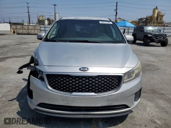2016 Kia Sedona L с VIN KNDMA5C16G6151920, выставлен на аукционе Copart как лот 60251035 с пробегом 105 790 миль миль и Списание • Salvage title. История ставок и продаж доступна на DreamBid. Изображение 5.