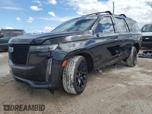 2023 Cadillac Escalade RWD Sport Platinum with VIN 1GYS3GKL8PR510371, listed as a Copart auction lot 46688015 with 19,795 mi miles and Salvage title. Bid and sale history available at DreamBid. Image 1.