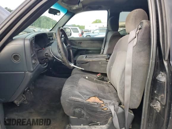 2000 Chevrolet Silverado 1500 LS with VIN 2GCEK19T6Y1330440, listed as a Copart auction lot 65127625 with 331,891 mi miles and Salvage title. Bid and sale history available at DreamBid. Image 7.
