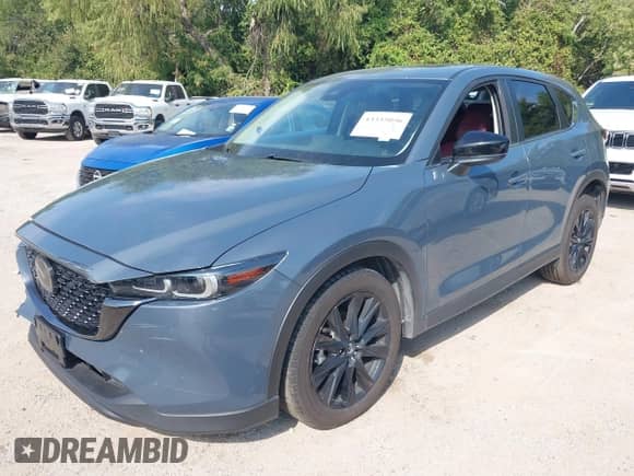 2025 Mazda CX-5 S Carbon Edition z VIN JM3KFBCM7S0587633, wystawiony jako IAAI lot #43335056 z przebiegiem 20 088 mil mil oraz . Historia ofert i sprzedaży dostępna na DreamBid. Obrazek 17.