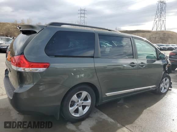 2012 Toyota Sienna LE AAS with VIN 5TDKK3DC3CS185395, listed as a Copart auction lot 86532494 with 119,733 mi miles and Salvage title. Bid and sale history available at DreamBid. Image 3.