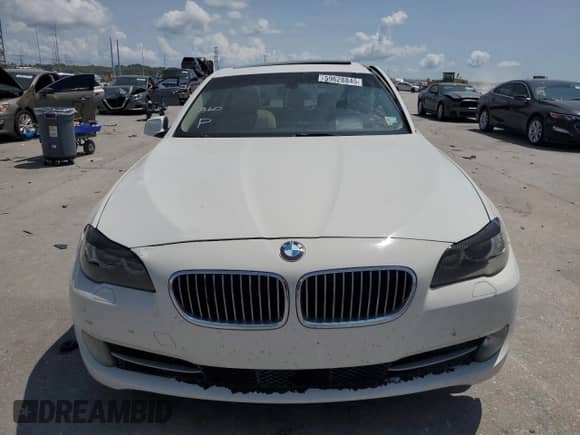 2013 BMW 5 Series 535i с VIN WBAFR7C50DC817468, выставлен на аукционе Copart как лот 59628845 с пробегом Не указан миль и Списание • Salvage title. История ставок и продаж доступна на DreamBid. Изображение 5.