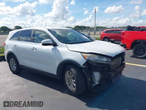 2019 Kia Sorento LX with VIN 5XYPG4A56KG475936, listed as a IAAI auction lot 42774927 with 165,286 mi miles and . Bid and sale history available at DreamBid. Image 1.