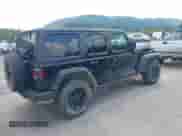 2021 Jeep Wrangler Unlimited Willys with VIN 1C4HJXDN7MW504854, listed as a IAAI auction lot 42605357 with 74,092 mi miles and . Bid and sale history available at DreamBid. Image 4.