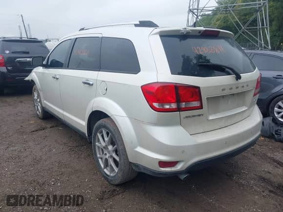2012 Dodge Journey Crew with VIN 3C4PDCDG3CT342092, listed as a IAAI auction lot 42883811 with 153,298 mi miles and . Bid and sale history available at DreamBid. Image 3.
