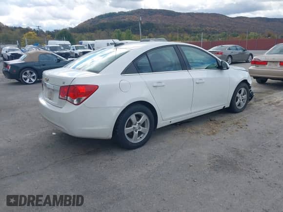 2016 Chevrolet Cruze LT с VIN 1G1PE5SB2G7210301, выставлен на аукционе IAAI как лот 43517445 с пробегом 102 515 миль миль и . История ставок и продаж доступна на DreamBid. Изображение 4.