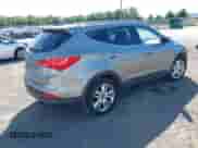 2014 Hyundai Santa Fe with VIN 5XYZWDLA0EG135854, listed as a IAAI auction lot 42995069 with 140,135 mi miles and . Bid and sale history available at DreamBid. Image 4.