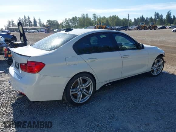 2013 BMW 3 Series 335i with VIN WBA3A9G5XDNP36238, listed as a IAAI auction lot 42347821 with 97,227 mi miles and . Bid and sale history available at DreamBid. Image 4.