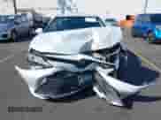 2020 Toyota Camry Hybrid XLE z VIN 4T1F31AK1LU541672, wystawiony jako IAAI lot #43125531 z przebiegiem 207 911 mil mil oraz . Historia ofert i sprzedaży dostępna na DreamBid. Obrazek 12.