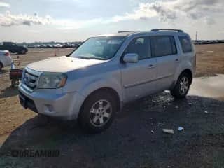 2011 Honda Pilot Touring with VIN 5FNYF3H97BB017646, listed as a Copart auction lot 70779255 with 219,787 mi miles and Clean title. Bid and sale history available at DreamBid. Image 1.