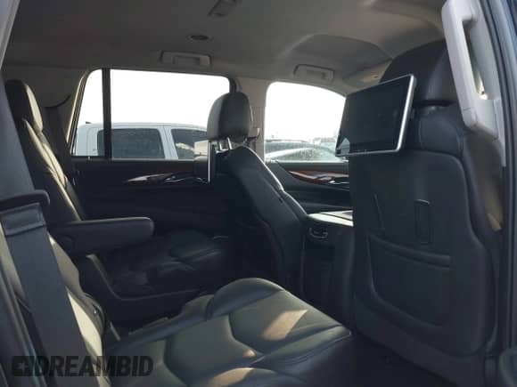 2018 Cadillac Escalade z VIN 1GYS3AKJXJR126577, wystawiony jako IAAI lot #41225966 z przebiegiem 69 845 mil mil oraz . Historia ofert i sprzedaży dostępna na DreamBid. Obrazek 8.