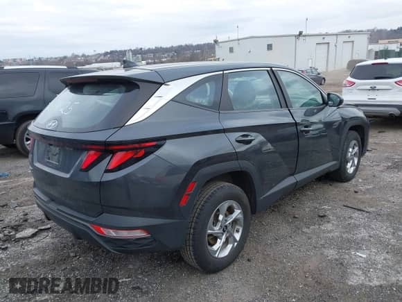 2022 Hyundai Tucson SE with VIN 5NMJACAE3NH000434, listed as a IAAI auction lot 41623118 with 54,781 mi miles and . Bid and sale history available at DreamBid. Image 4.