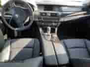 2013 BMW 5 Series 528i xDrive z VIN WBAXH5C51DDW16801, wystawiony jako Copart lot #65857445 z przebiegiem 99 614 mil mil oraz Czysty tytuł • Clean title. Historia ofert i sprzedaży dostępna na DreamBid. Obrazek 8.