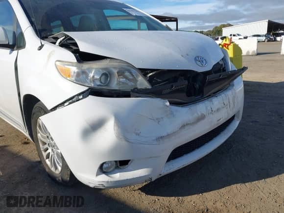 2013 Toyota Sienna XLE AAS with VIN 5TDYK3DC8DS324853, listed as a IAAI auction lot 41647704 with 143,656 mi miles and . Bid and sale history available at DreamBid. Image 6.