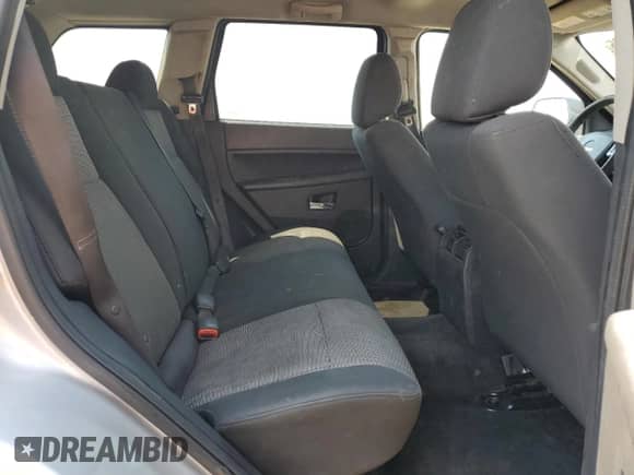 2009 Jeep Grand Cherokee Laredo with VIN 1J8GS48K79C512557, listed as a Copart auction lot 67475735 with 204,364 mi miles and Salvage title. Bid and sale history available at DreamBid. Image 11.