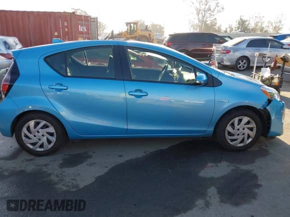 2015 Toyota Prius One z VIN JTDKDTB30F1100611, wystawiony jako IAAI lot #43148415 z przebiegiem 49 544 mil mil oraz . Historia ofert i sprzedaży dostępna na DreamBid. Obrazek 14.