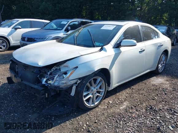 2014 Nissan Maxima S z VIN 1N4AA5AP6EC443355, wystawiony jako IAAI lot #42940773 z przebiegiem 127 130 mil mil oraz . Historia ofert i sprzedaży dostępna na DreamBid. Obrazek 2.