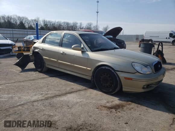 2002 Hyundai Sonata z VIN KMHWF25S42A656824, wystawiony jako Copart lot #46411645 z przebiegiem 194 814 mil mil oraz Szkoda całkowita • Salvage title. Historia ofert i sprzedaży dostępna na DreamBid. Obrazek 4.
