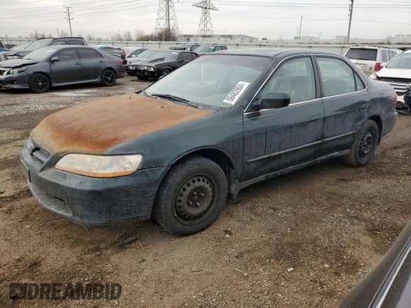 2000 Honda Accord LX z VIN 1HGCG6554YA148286, wystawiony jako Copart lot #86483904 z przebiegiem Nie podano mil oraz Szkoda całkowita • Salvage title. Historia ofert i sprzedaży dostępna na DreamBid. Obrazek 1.